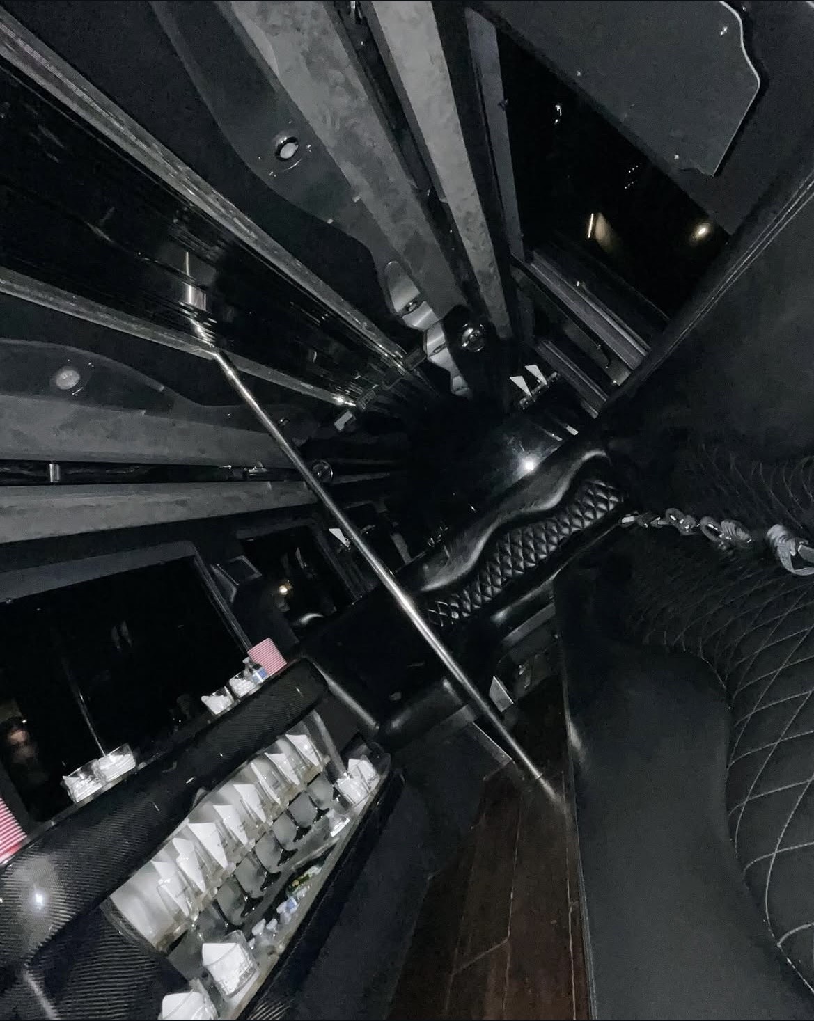 Inside a black party limousine