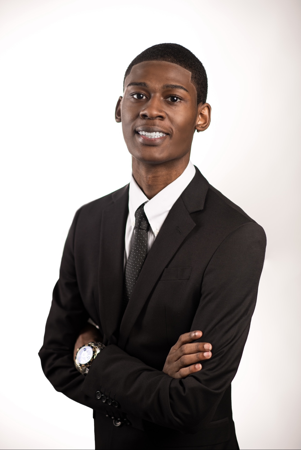 Black suit, studio headshot