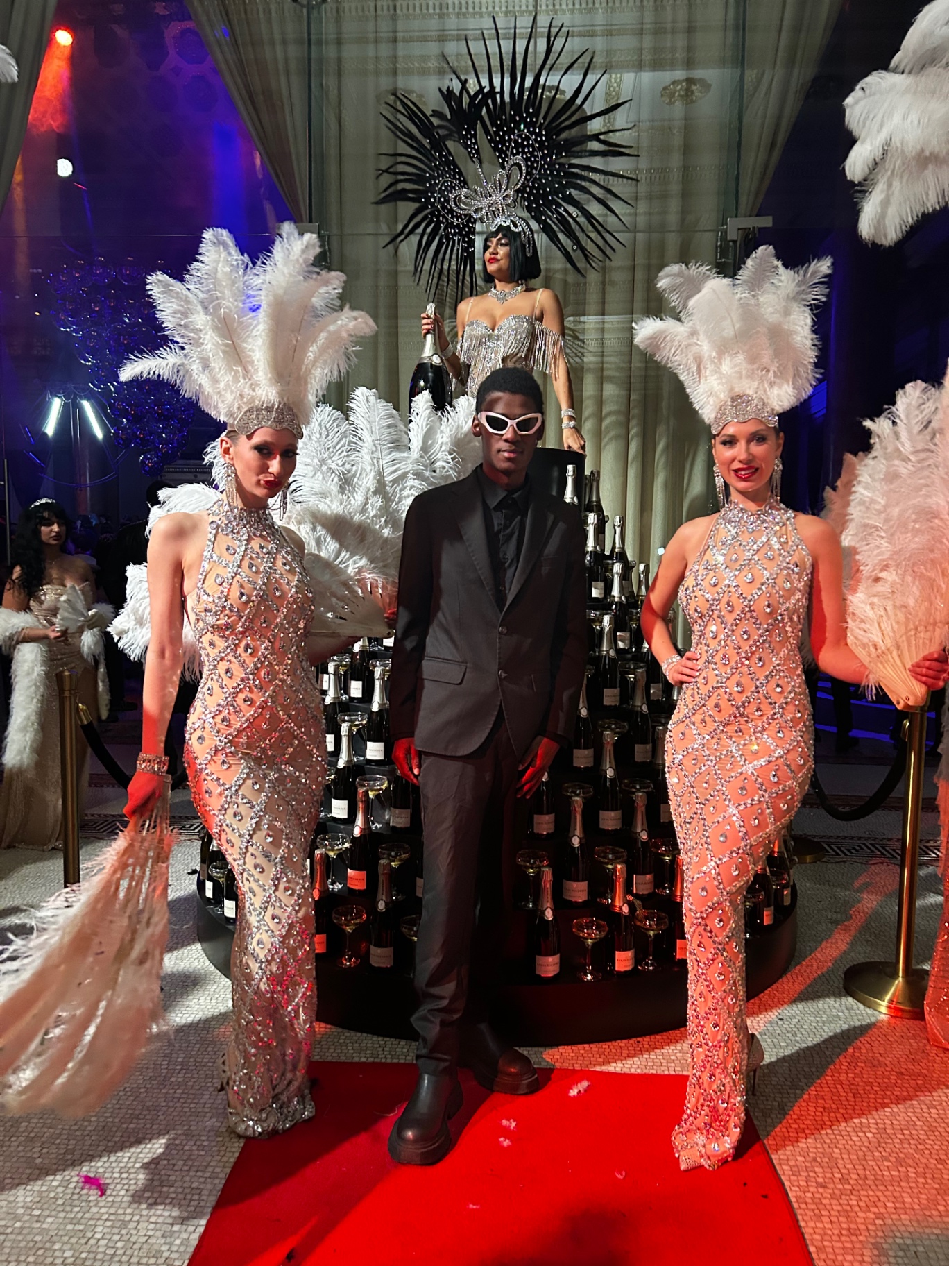 Showgirls in feathers and sequins